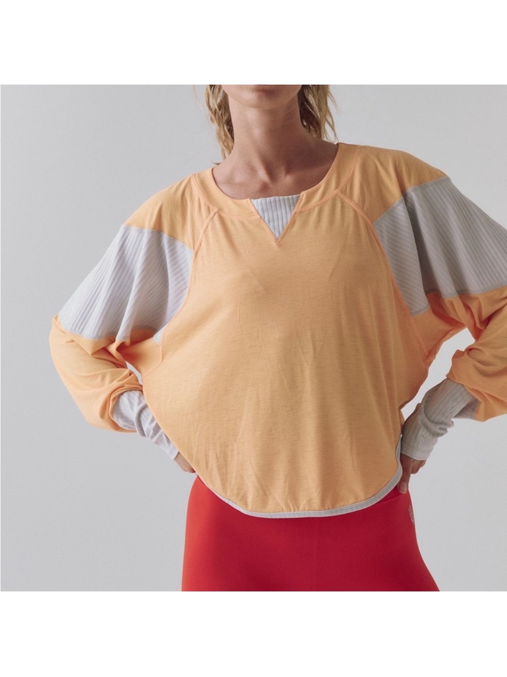 FP Movement by Free People spotlight long sleeve layer in papaya combo